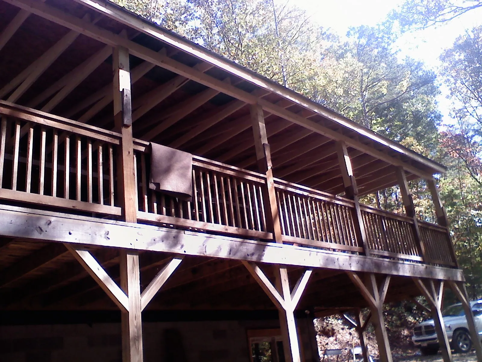 Timber framing under a new elevated porch and deck — Roof Leak Repair in Manilla by Roofing Brothers